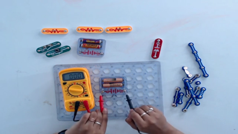 connecting-multimeter-terminal-of-a-battery