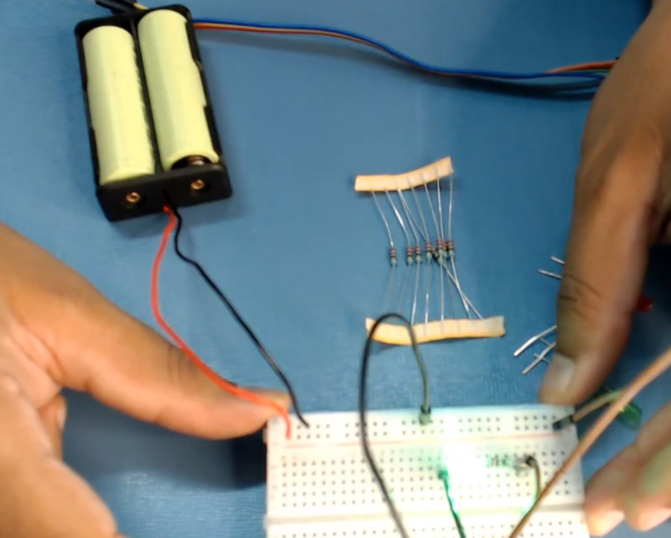 power-up-the-breadboard-by-providing-positive-and-negative-supplies-from-the-battery