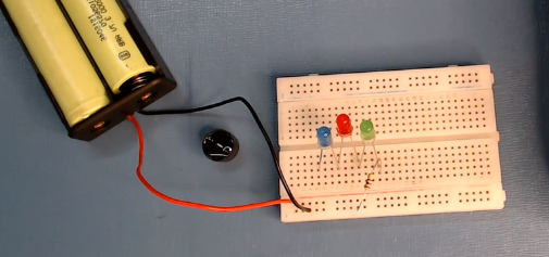 power-up-the-breadboard-by-providing-positive-and-negative-supplies-from-the-battery